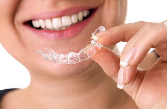 What are invisible braces and how do they work?